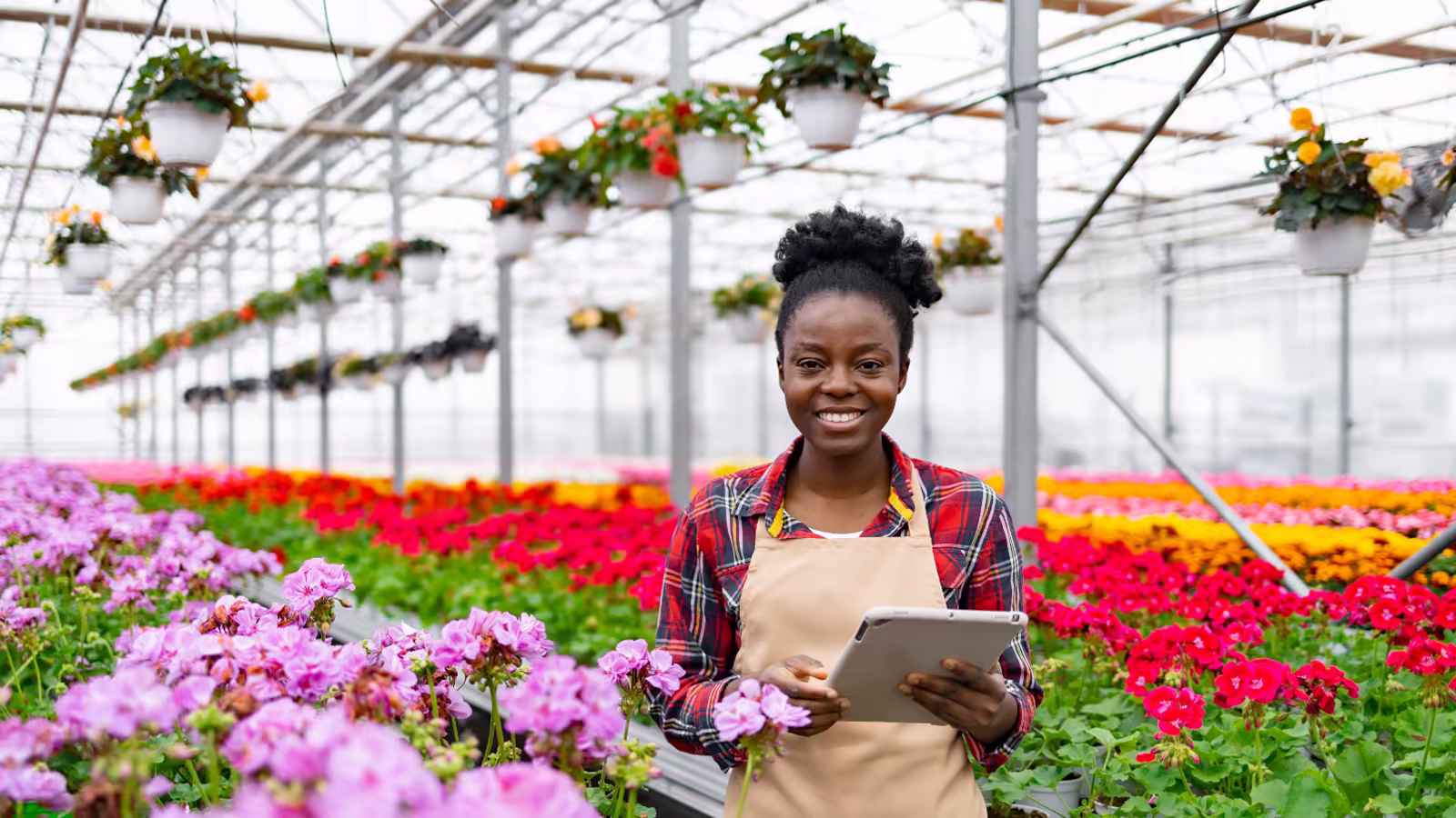 Young agribusiness leader in a greenhouse